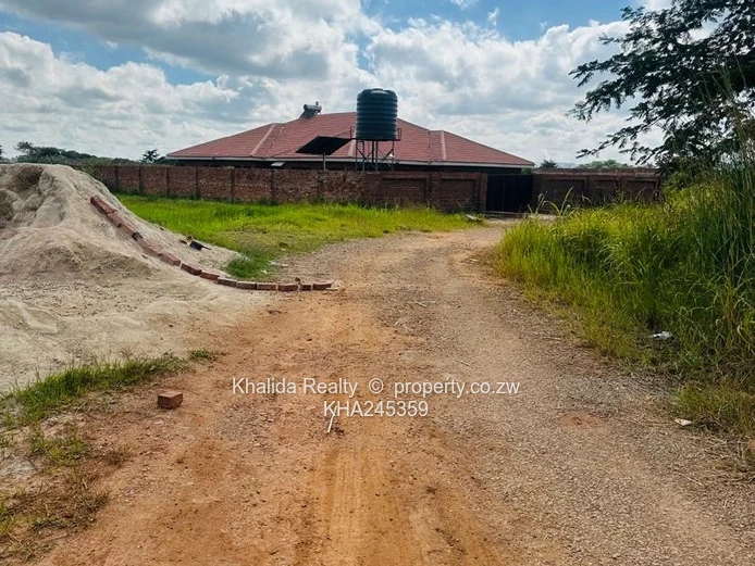 Mwashuma Park 1200sqm Stand With Bricks For Sale 